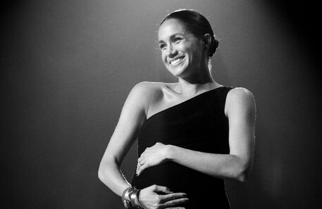 Ladies and gentlemen, Miss Meghan Markle!
