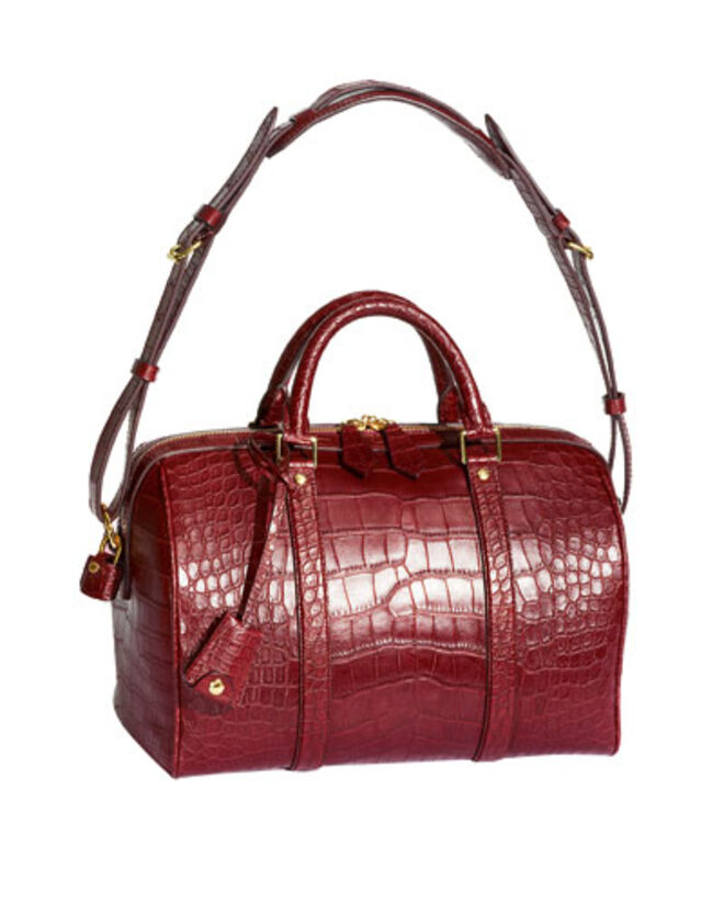 Carteira em pele de crocodilo Louis Vuitton.