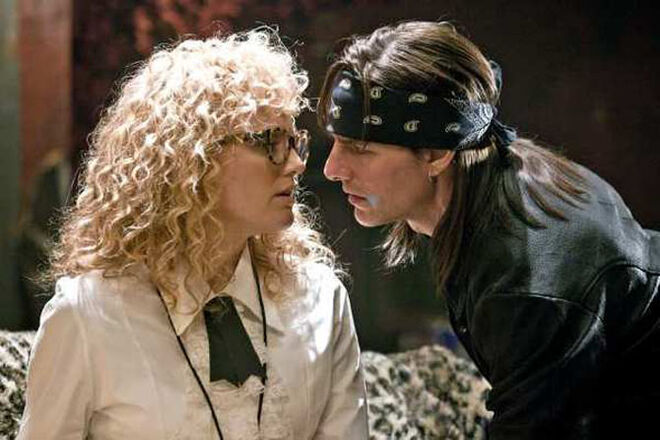 Com Tom Cruise, em Idade do Rock (2012).