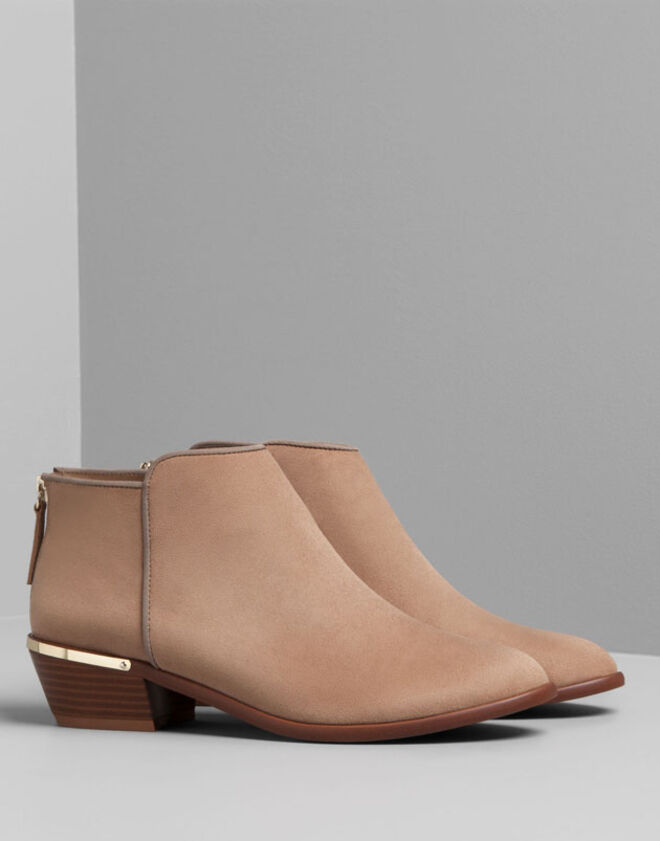 Os botins ideais para usar com skinny jeans