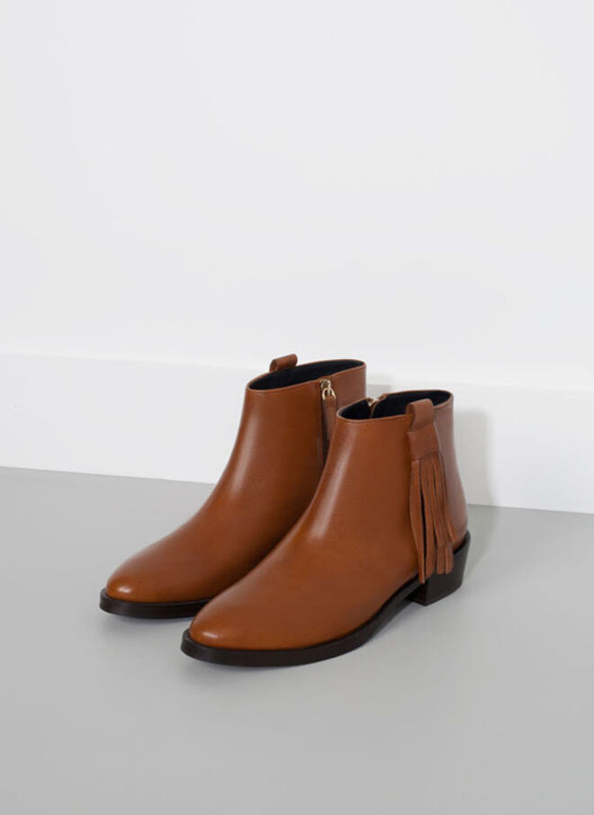 Os botins ideais para usar com skinny jeans