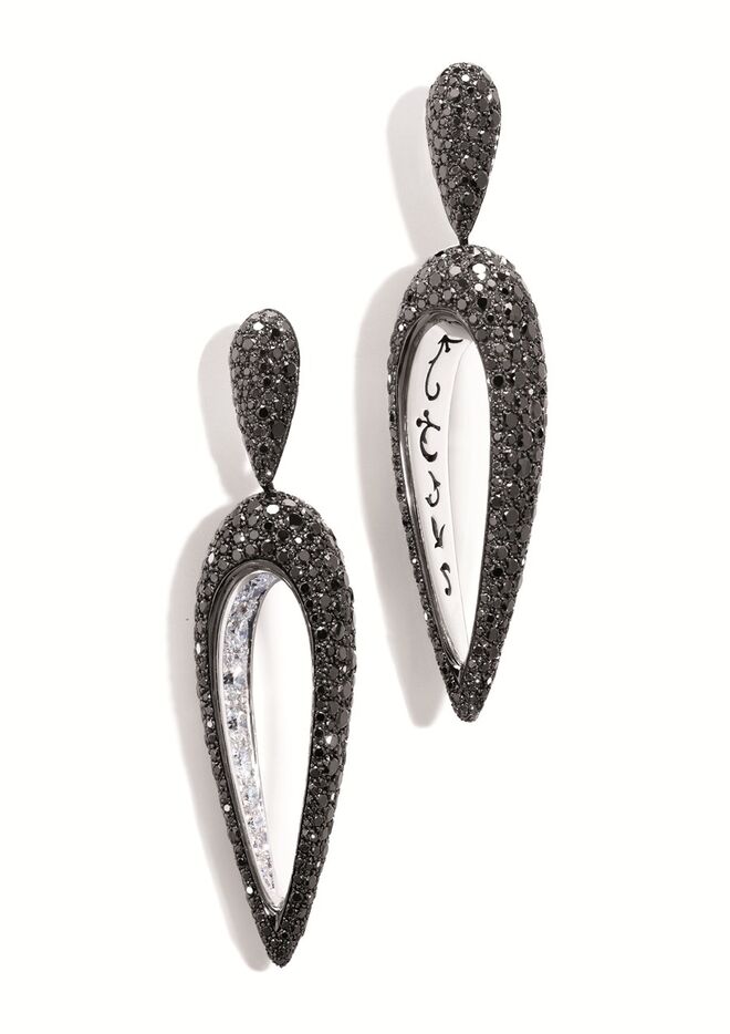 Natasha Poly com brincos De Grisogono