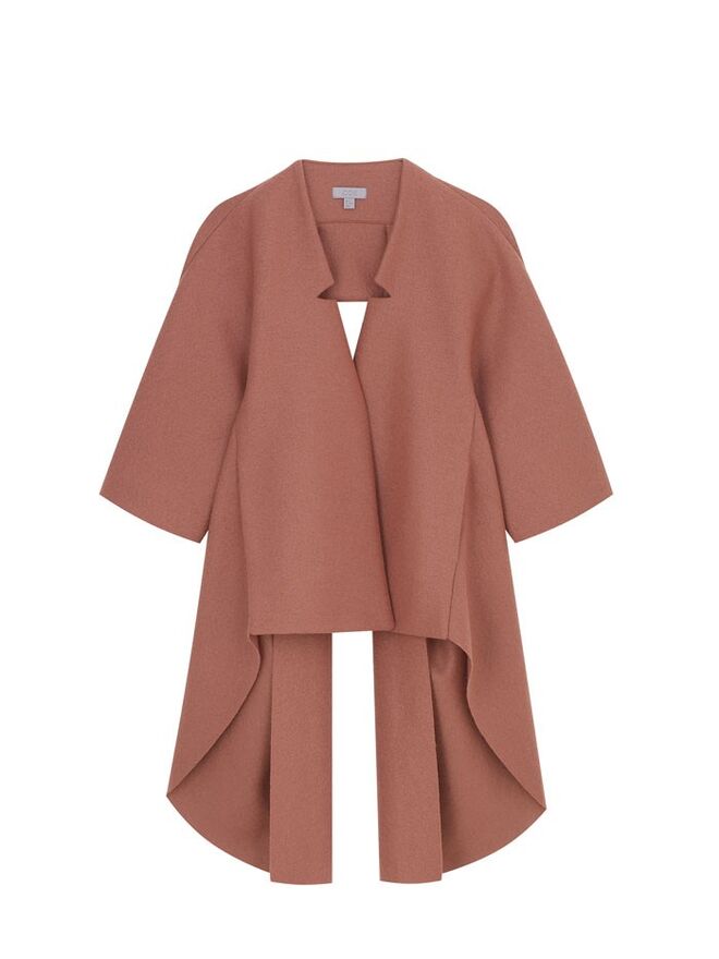 Casaco em lã, €150, COS