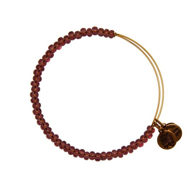 Pulseira em metal dourado com contas, €30, Alex and Ani, na Boutique dos Relógios