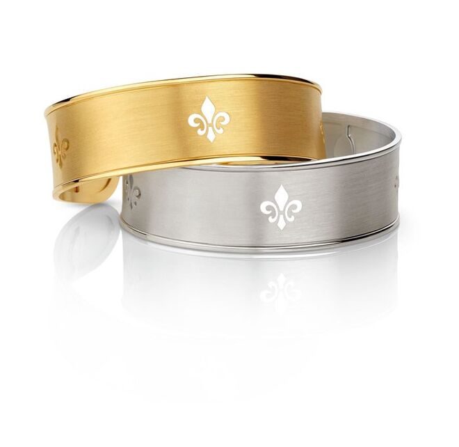 Pulseiras em prata dourada e prata, €220 (cada), Nomination