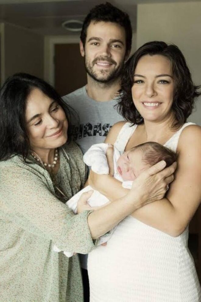 Com o filho, a nora e o neto