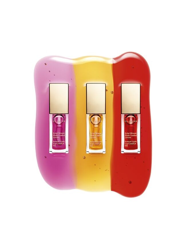  Huile Confort Lèvres, Clarins. Sorria! Uma nova tonalidade de Huile Confort Lèvres que cuida dos seus lábios ao mesmo tempo que lhe oferece um brilho extremo e que se vem juntar às duas cores já existentes. Este óleo, um cuidado com cor, reconfortante e que não cola, nutre e proporciona volume aos lábios de um vermelho puro, claro e luminoso, €21,50 