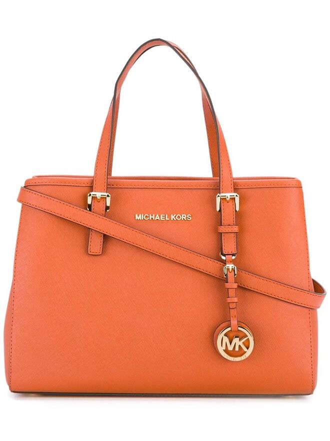 Carteira, €283, Michael Michael Kors, em farfetch.com