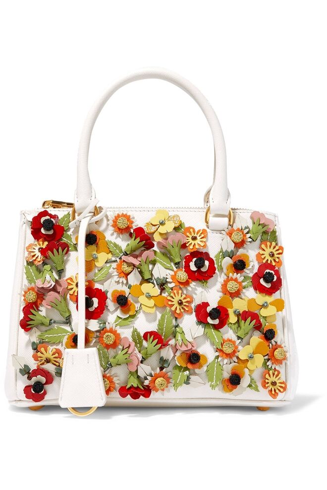 Carteira em pele com aplicações, €2500, Prada 