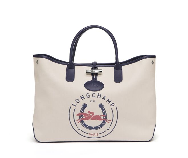 Carteira em tela e pele, €280, Longchamp