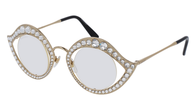 Óculos em metal com cristais Swarovski, €550, Gucci