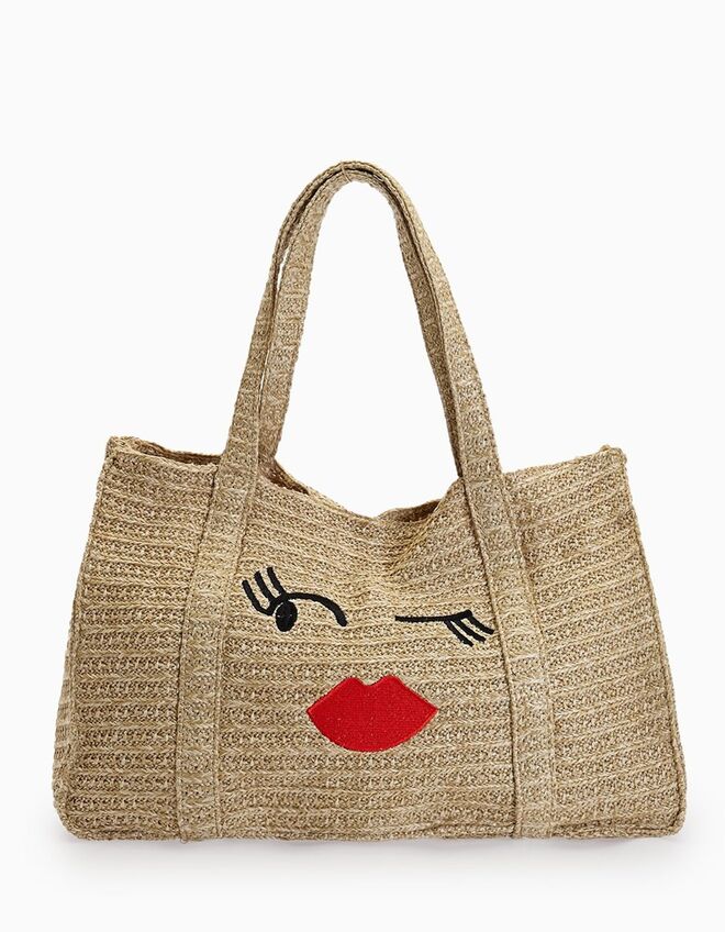 Shopper de ráfia, €19,95, Stradivarius