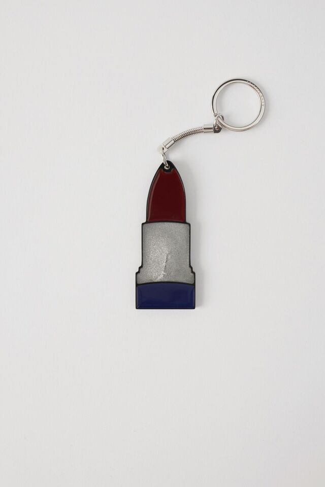 Porta-chave Lipstick K purple, €90, Acne Studios