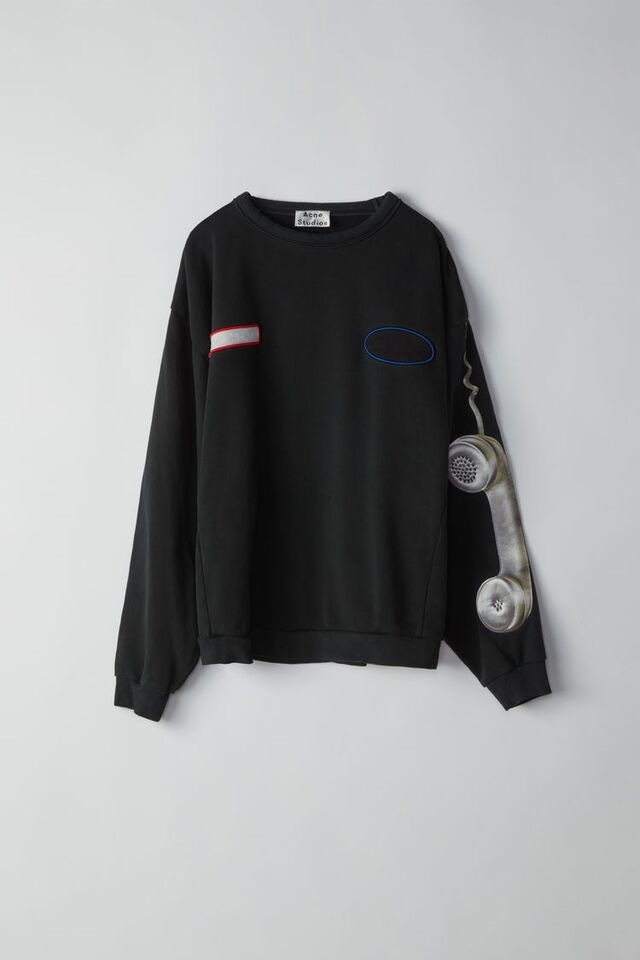 Suéter Fire black phone print, €350, Acne Studios