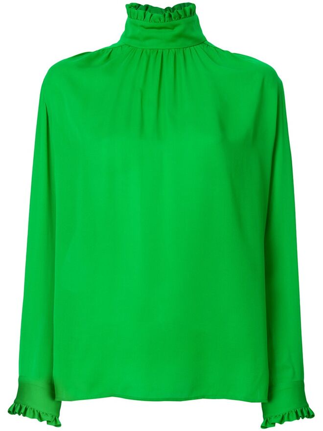 Blusa, €890, Gucci