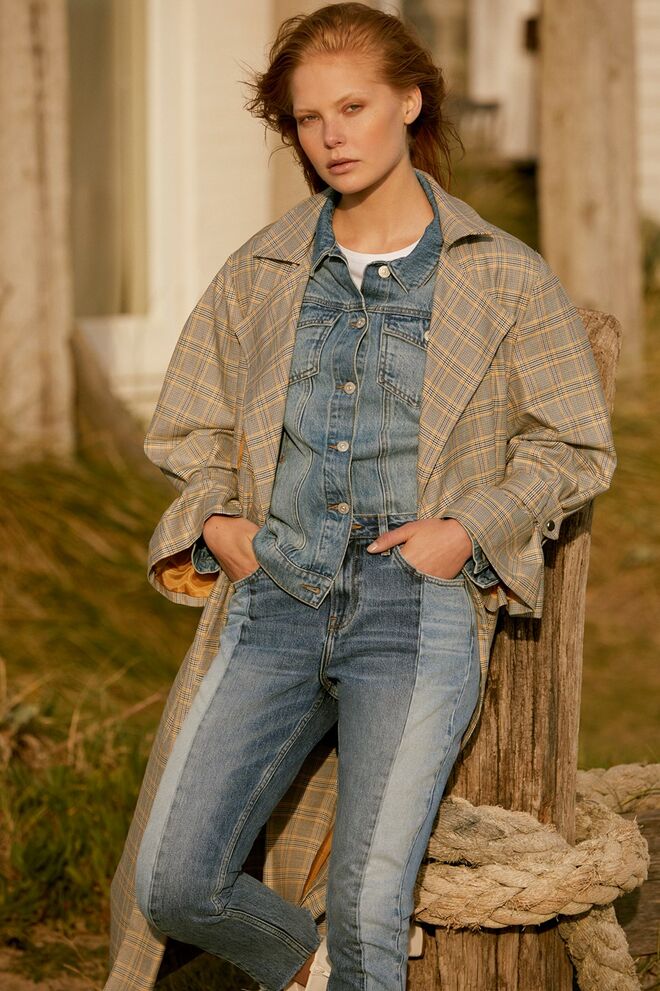 Casaco (€40), jaqueta de ganga (€19), T–Shirt (€3,50), calça de ganga (€19), tudo Primark.