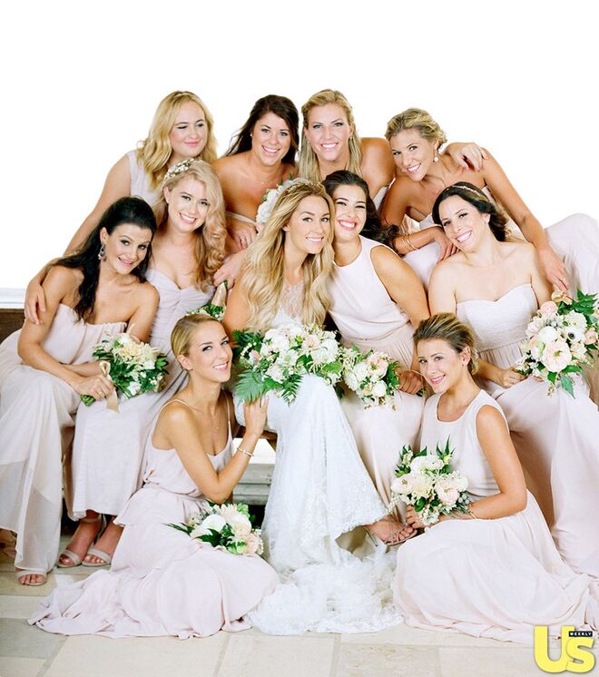Lo Bosworth | A atriz foi uma das damas de honor no casamento de Lauren Conrad com William Tell, em setembro de 2014. 