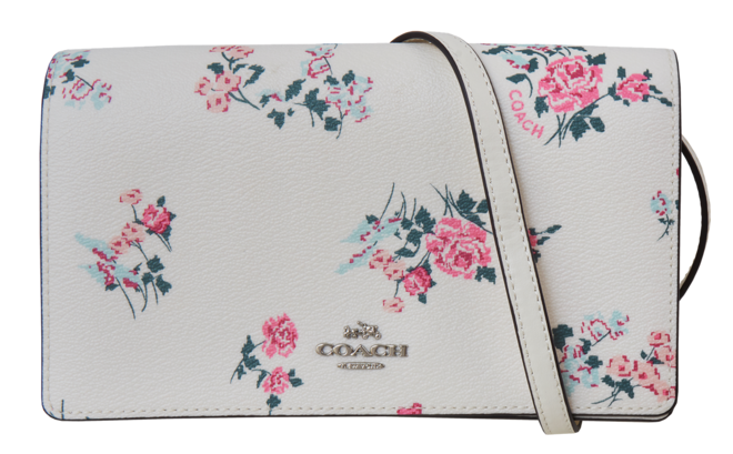 Carteira em pele,  Coach, €119 (PVP €195) no Freeport Lisboa Fashion Outlet e Vila do Conde Porto Fashion Outlet