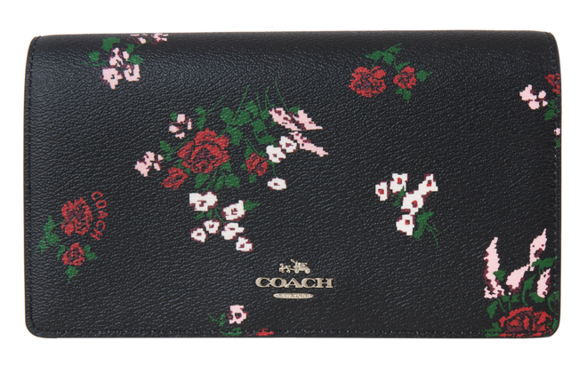 Carteira em pele, Coach, €119 (PVP €195) no Freeport Lisboa Fashion Outlet e Vila do Conde Porto Fashion Outlet
