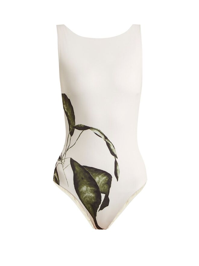Leaf-print boat-neck maillot swimsuit, €289, Haight, em www.matchesfashion.com