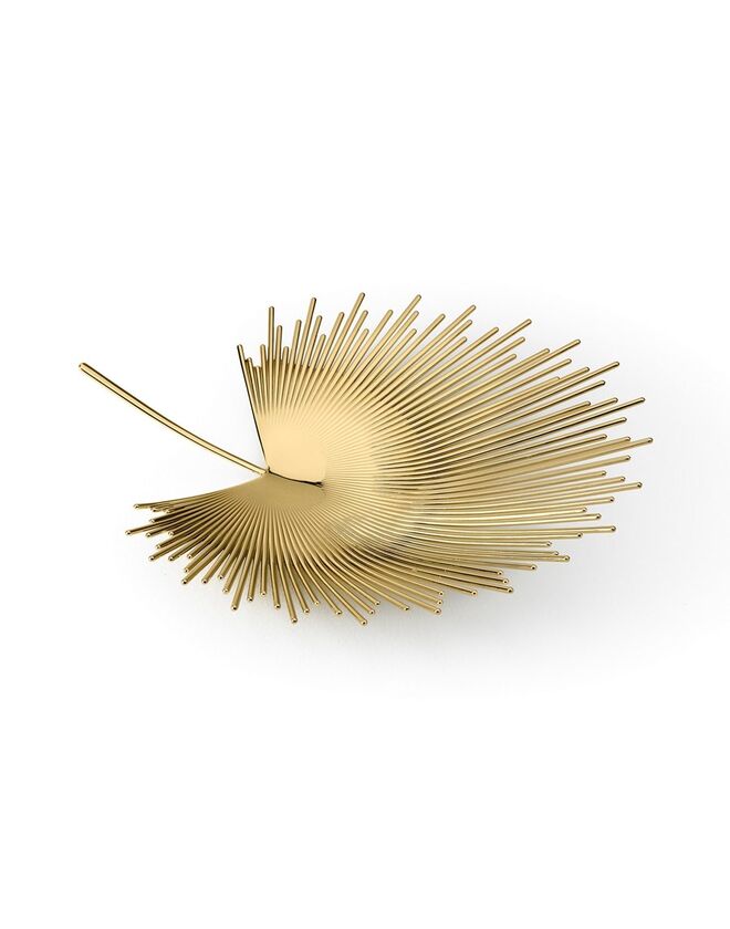 Centro de mesa Florida em metal, €380, Ghidini1961 design by Nika Zupanc, em yoox.com