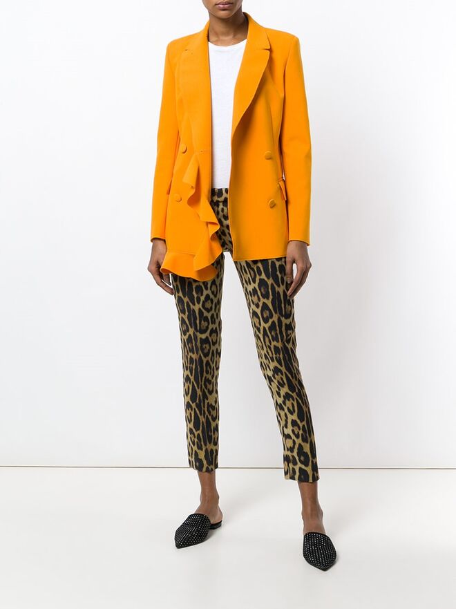 Calças: €187, Moschino Vintage, em Farfetch