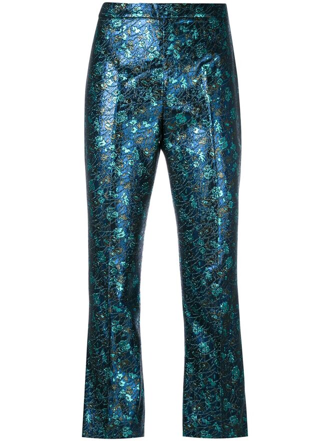 Calças metalizadas, €722, Prada, farfetch.com 