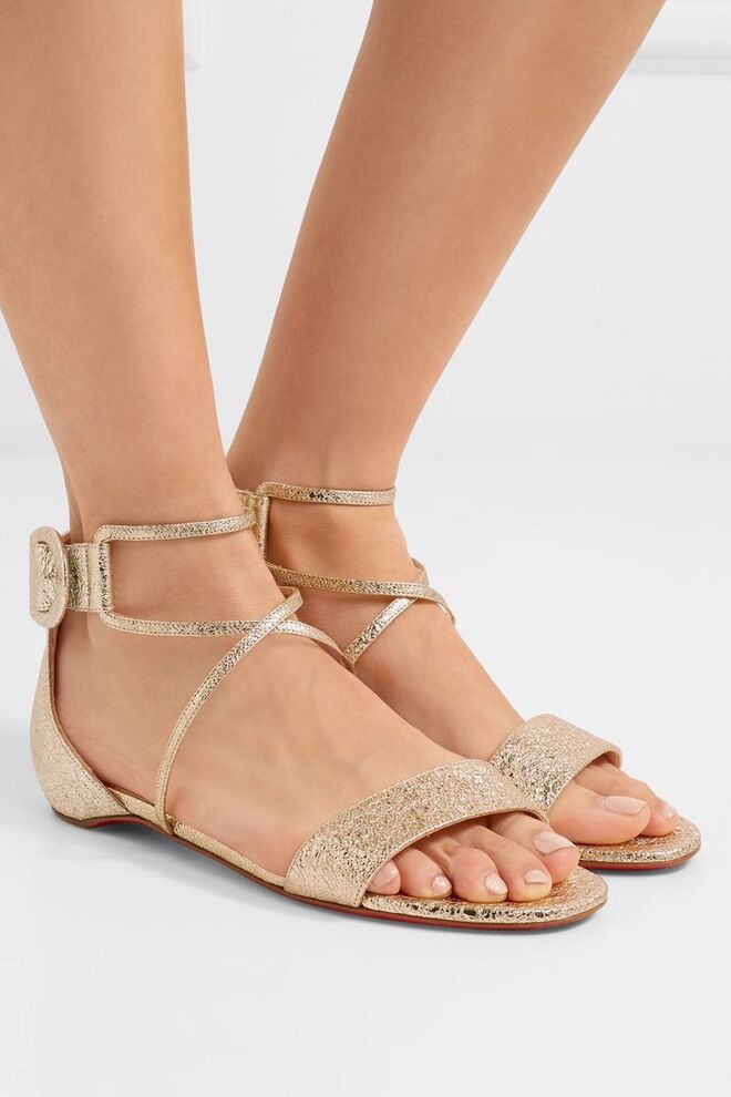 Sandálias, €645, Christian Louboutin 