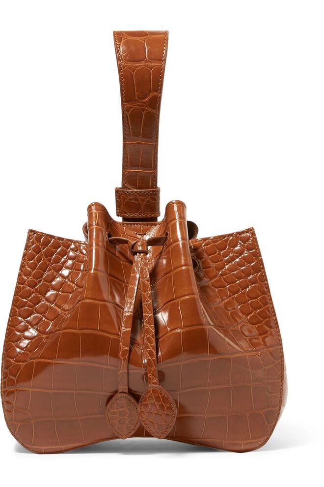 Mala em pele de crocodilo, €12.560, Alaïa, net-a-porter.com