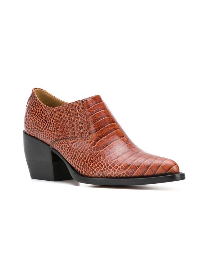 Botins em pele, €695, Chloé, farfetch.com