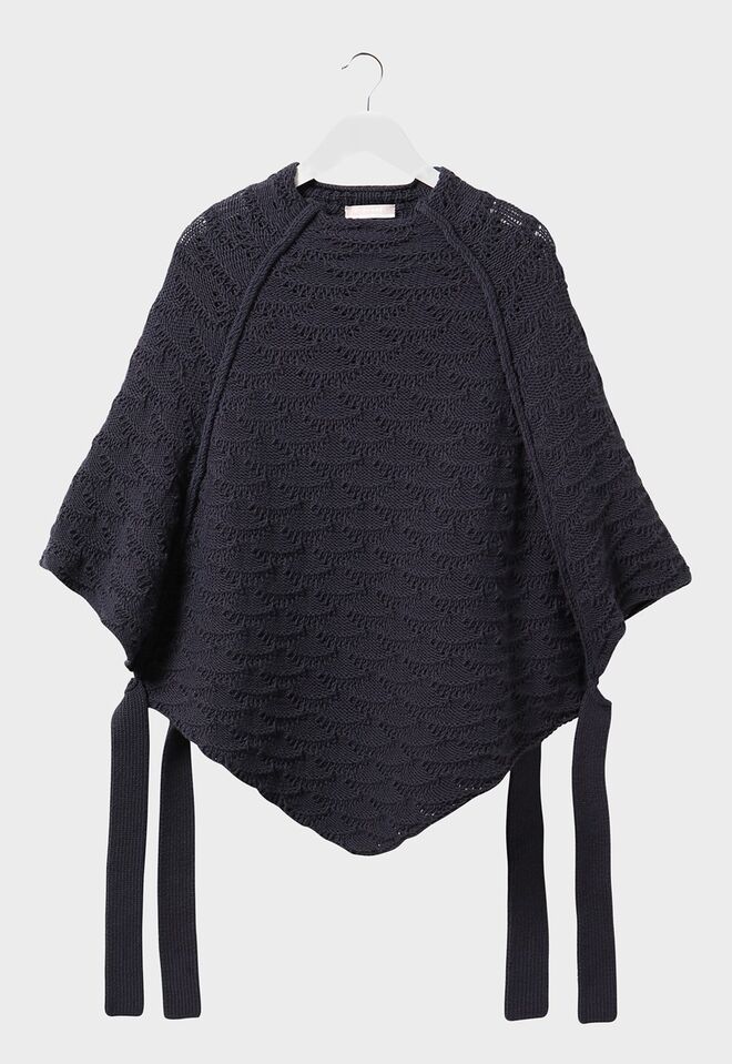 Poncho azul escuro, €215, Stefanel