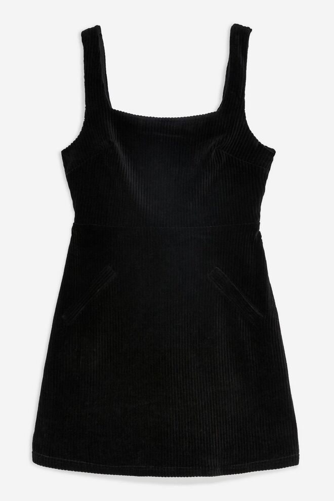 Corduroy Open Back Pinafore Dress, €40, Topshop, em eu.topshop.com