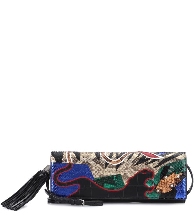 Clutch, agora €1194, Saint Laurent, em www.mytheresa.com