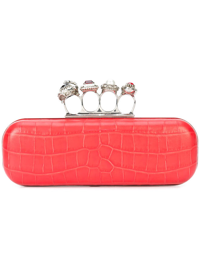 Carteira, €3505, Alexander McQueen, em www.farfetch.com