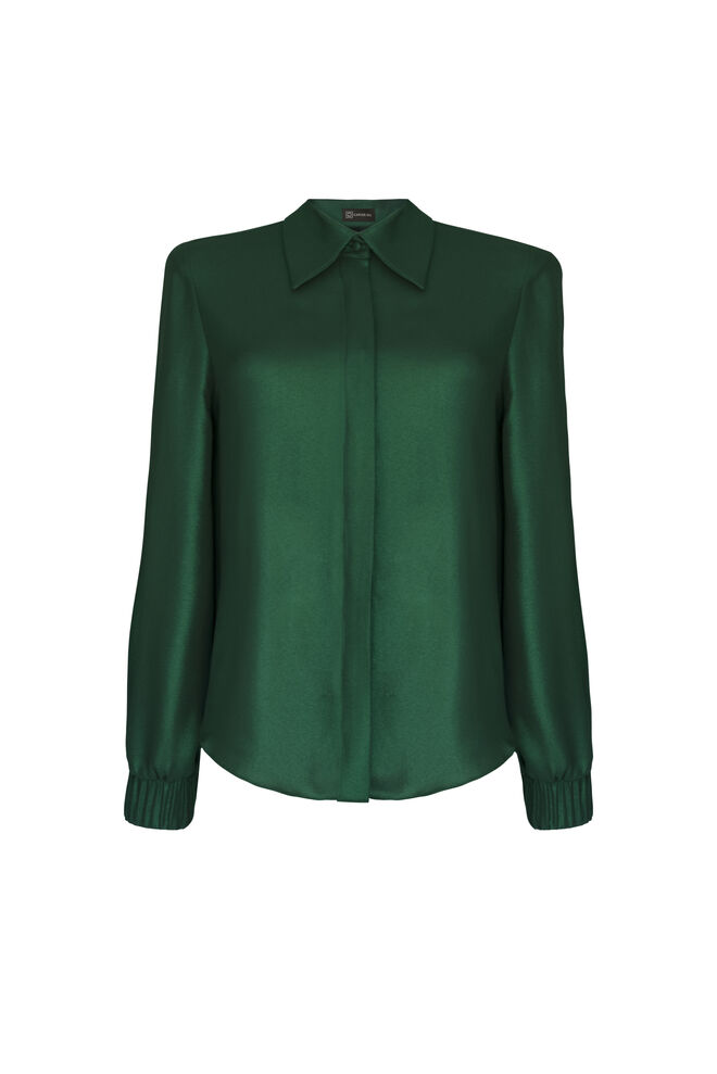 Blusa, €180, Carlos Gil