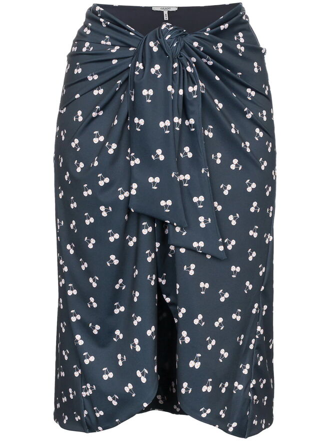 Saia, €236, Ganni, em www.farfetch.com