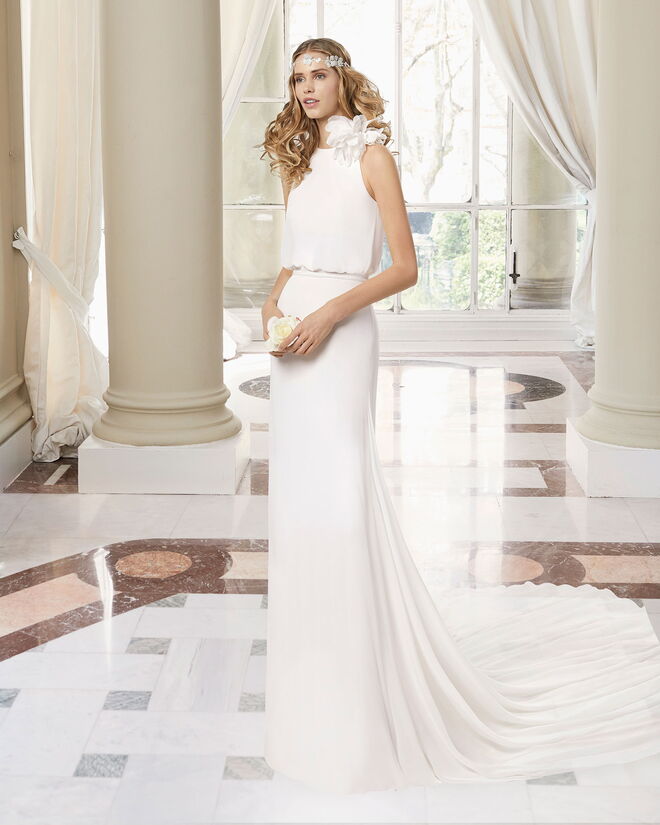 Aquário (20 de janeiro – 18 de fevereiro) | A noiva Aquário procura sobretudo algo vintage e de preferência sustentável. As tradições e dress codes demasiado rígidos não encaixam nas mulheres deste signo, por isso, um vestido midi ou um look não convencional são a opção de eleição. | Rosa Clará, Manhattan