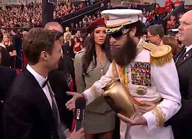 Ryan Seacrest estava a entrevistar Sacha Baron Cohen (que vinha vestido como a sua personagem no filme 'O Ditador') na passadeira vermelha dos Óscares de 2012, quando este lhe atirou com cinzas, deixando Seacrest muito desconfortável e visivelmente chateado. 