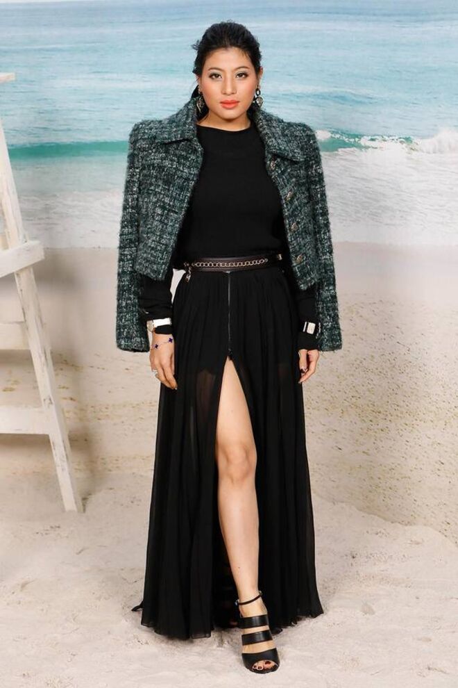 Princesa Sirivannavari Nariratana num look Chanel para o desfile da marca em 2018.