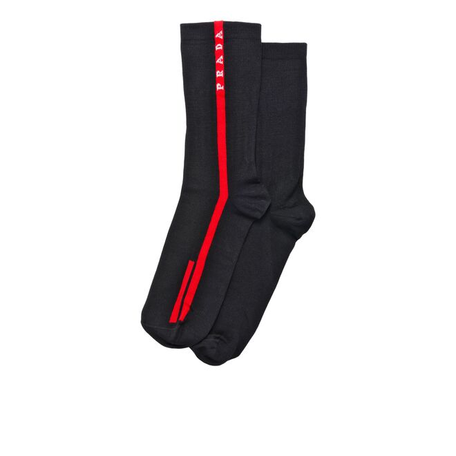 Meias, €150, Prada