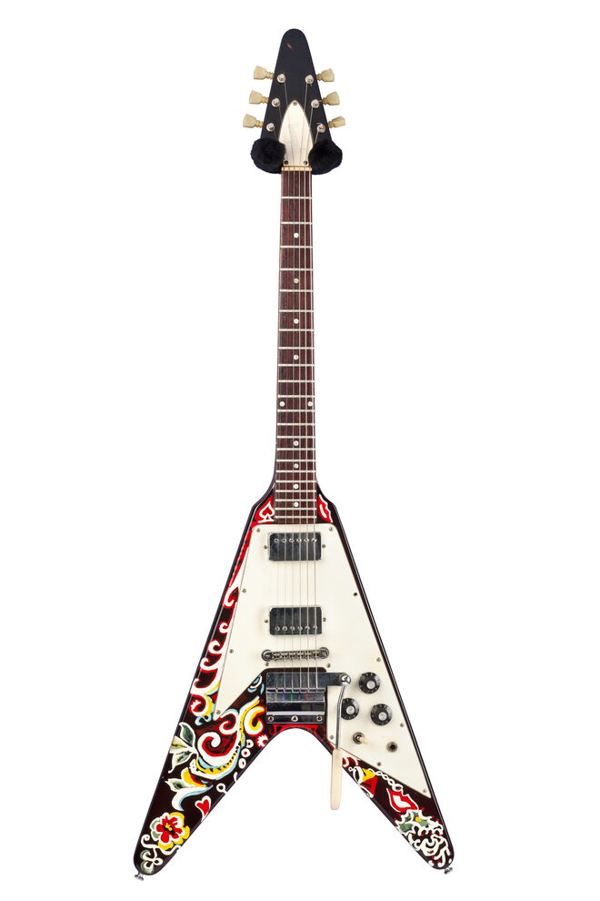 Guitarra elétrica, “Love Drops,” Flying V. Guitarra Gibson Corp., pintada originalmente por Jimi Hendrix, 1967. Coleção de William C. Butler, Vanderpool, Tex.