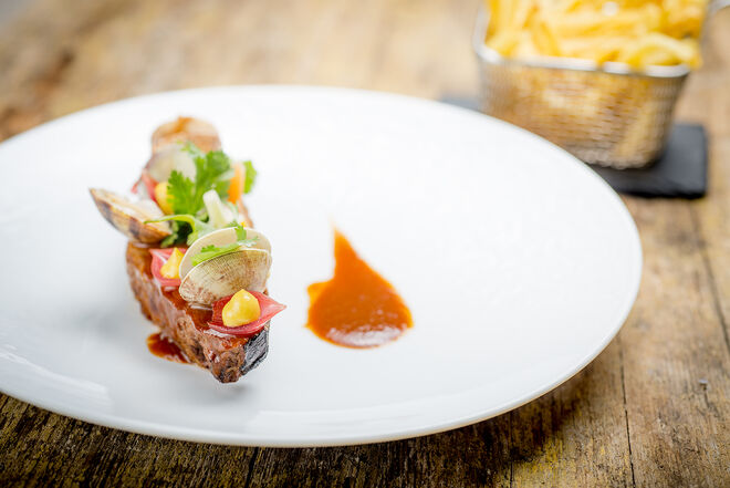 Carne de porco à alentejana