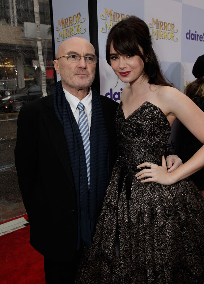 A atriz Lily Collins e o pai Phil Collins