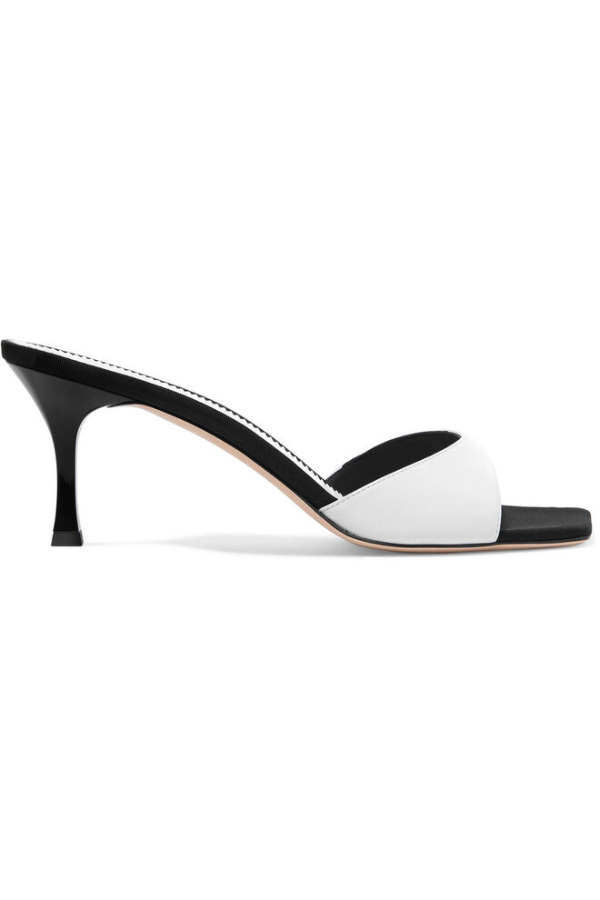 Mules, agora €285, Giuseppe Zanotti, em www.net-a-porter.com