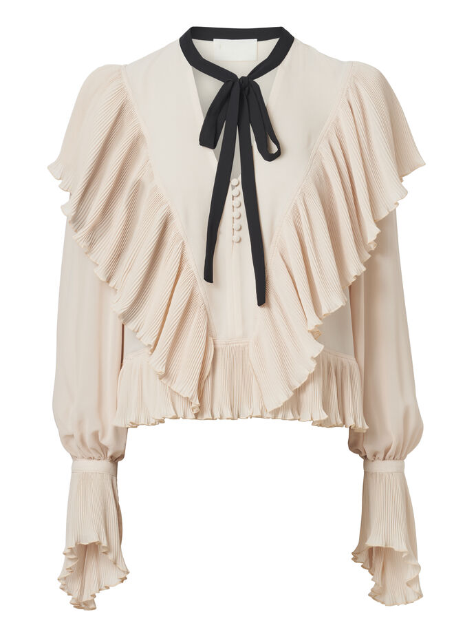 Blusa, €59,99, H&M Conscious Exclusive