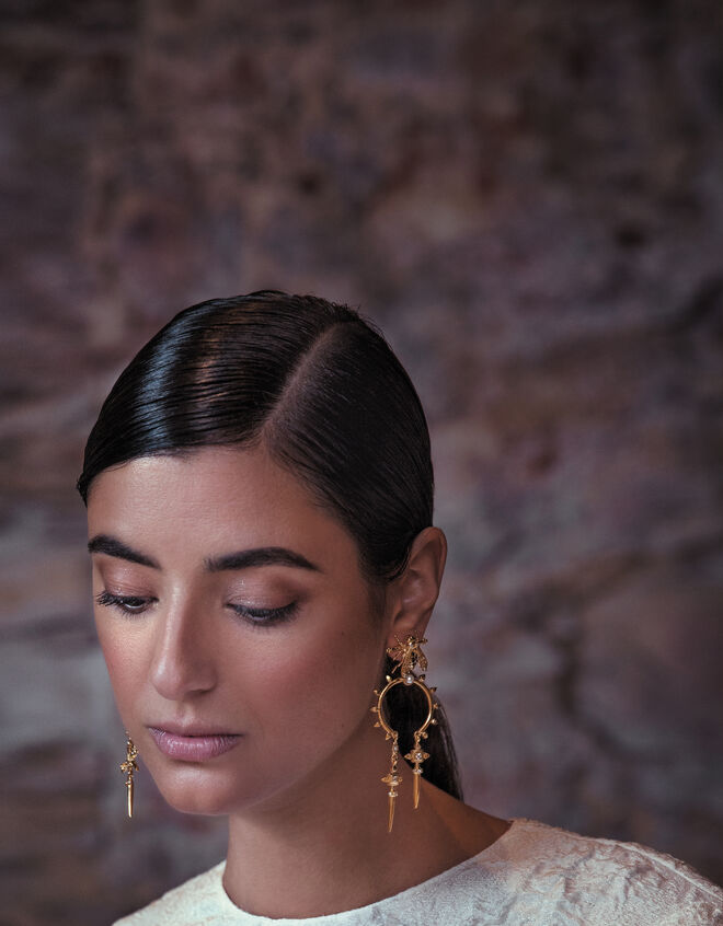 Carolina Curado. Top, Zara. Brincos, Carolina Curado.