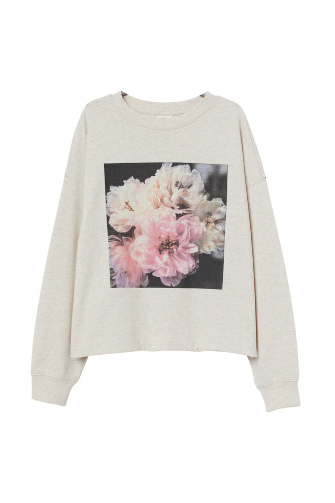 Sweatshirt da coleção cápsula Helena Christensen x H&M, €19,99, H&M