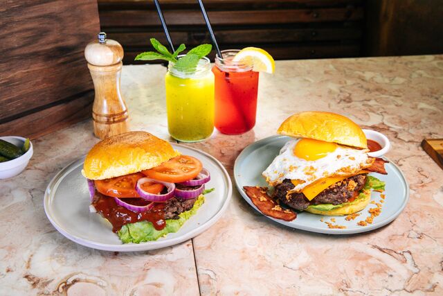 Olívia | Uma novidade do SEAME Group, a marca de hambúrgueres Olívia já está disponível na Uber Eats. Há nove hambúrgueres diferentes para provar, que farão desta uma altura menos difícil. 