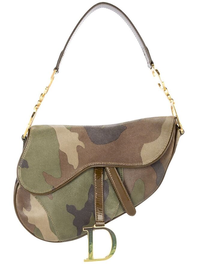 Carteira, €5583, Dior, em www.farfetch.com