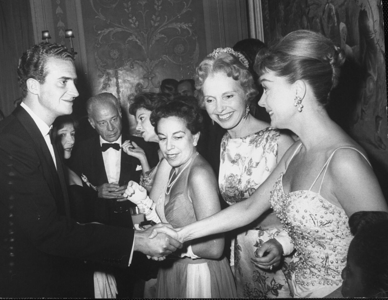 Rei Juan Carlos numa festa, em 1961.